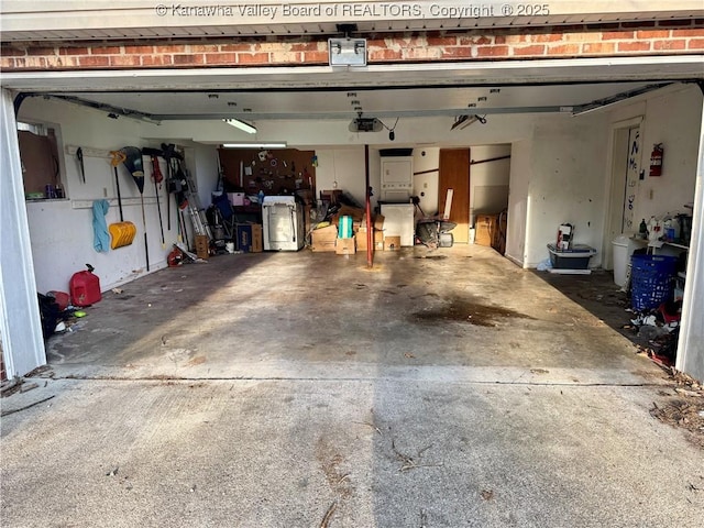 109 Cedar Ln, Saint Albans, WV 25177 - garage featuring a garage door opener
