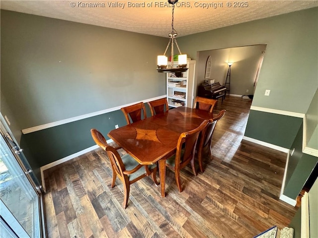 109 Cedar Ln, Saint Albans, WV 25177 - dining area with baseboards, wood finished floors, and a textured ceiling