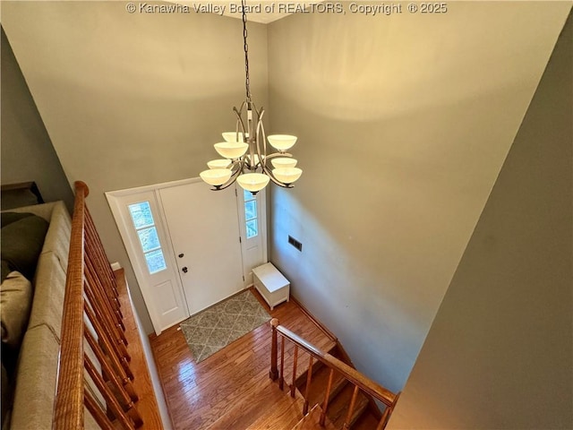 109 Cedar Ln, Saint Albans, WV 25177 - entryway featuring wood finished floors and a notable chandelier