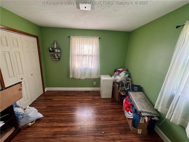 109 Cedar Ln, Saint Albans, WV 25177 - unfurnished bedroom featuring baseboards, wood finished floors, and a textured ceiling