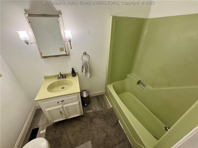 109 Cedar Ln, Saint Albans, WV 25177 - full bath with baseboards, toilet, vanity, and wood finished floors