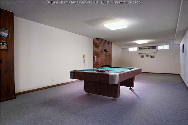 1055 Highland Dr, Saint Albans, WV 25177 - recreation room with pool table, baseboards, a wall mounted AC, a textured ceiling, and carpet flooring