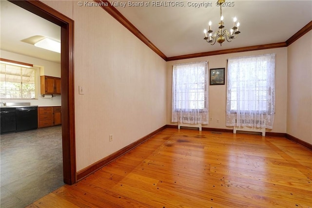 1055 Highland Dr, Saint Albans, WV 25177 - empty room featuring baseboards, ornamental molding, a chandelier, and light wood finished floors