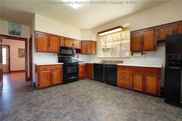 1055 Highland Dr, Saint Albans, WV 25177 - kitchen featuring black appliances, brown cabinets, a sink, and light countertops