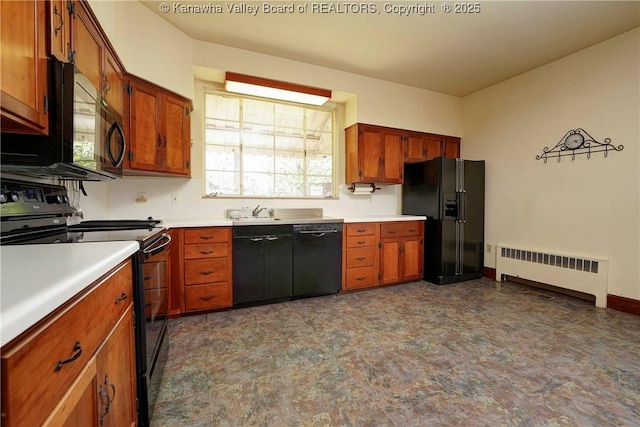 1055 Highland Dr, Saint Albans, WV 25177 - kitchen featuring a sink, radiator, brown cabinets, light countertops, and black appliances