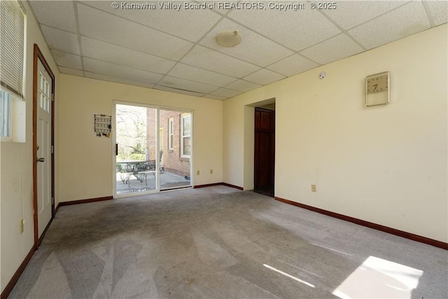 1055 Highland Dr, Saint Albans, WV 25177 - carpeted spare room featuring baseboards and a drop ceiling
