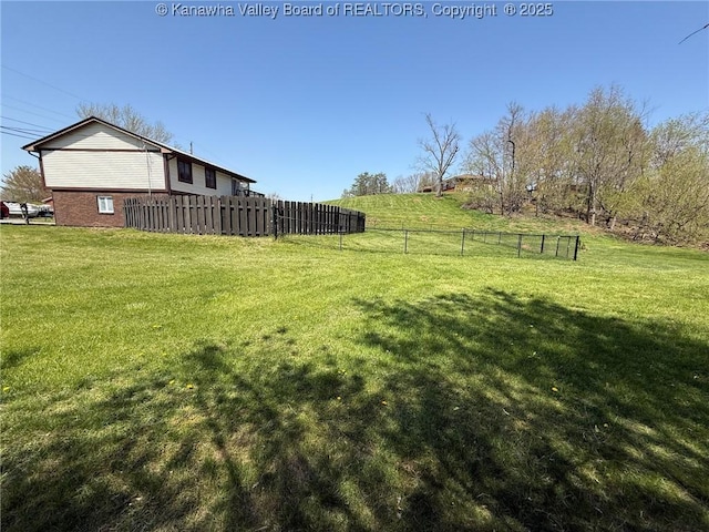 view of yard featuring fence