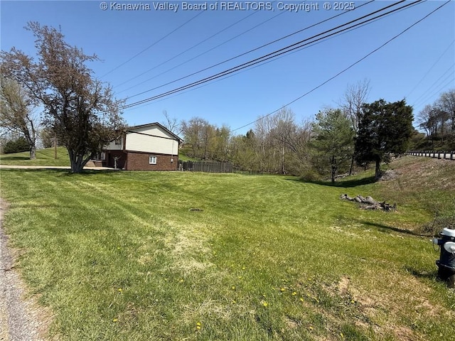 view of yard with fence