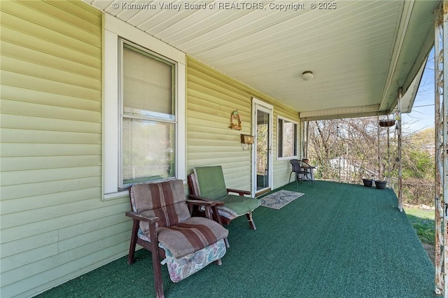 view of patio featuring a porch