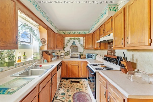 kitchen featuring under cabinet range hood, light countertops, dishwasher, a sink, and electric range oven