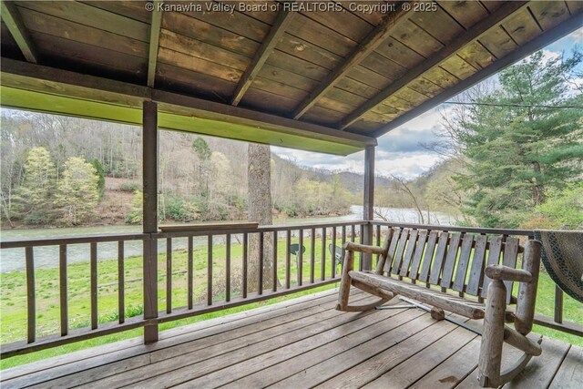 356 Joes Rd, Bomont, WV 25164 - deck with a lawn and a wooded view