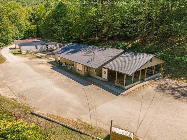drone / aerial view with a forest view