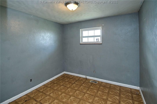 455 Kane St, Milton, WV 25541 - unfurnished room with baseboards and visible vents