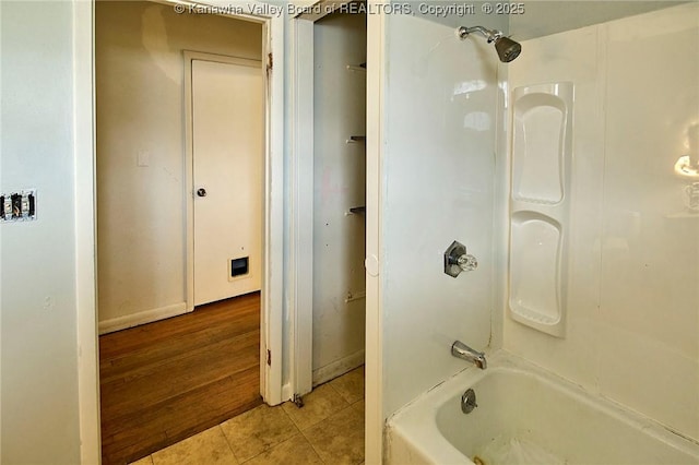 455 Kane St, Milton, WV 25541 - bathroom featuring shower / bathing tub combination and tile patterned floors