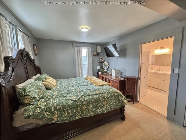 2206 Jefferson Ave, Point Pleasant, WV 25550 - carpeted bedroom with a sink and connected bathroom