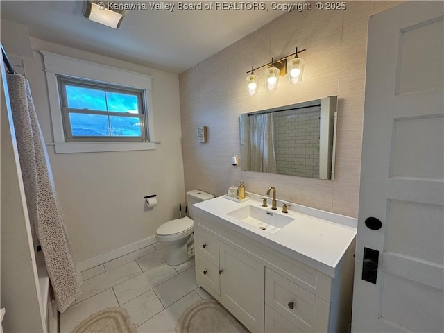 2206 Jefferson Ave, Point Pleasant, WV 25550 - full bath with baseboards, toilet, and vanity