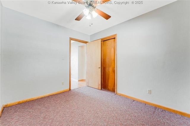 unfurnished bedroom featuring carpet floors, a closet, a ceiling fan, and baseboards