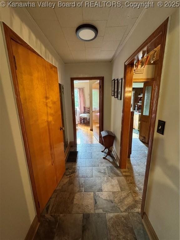 12376 Elk River Rd N, Clendenin, WV 25045 - corridor with stone tile flooring and baseboards