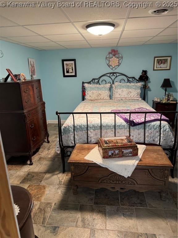 12376 Elk River Rd N, Clendenin, WV 25045 - bedroom with stone tile floors and a paneled ceiling