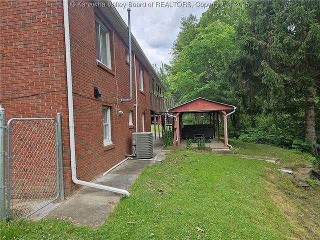 12376 Elk River Rd N, Clendenin, WV 25045 - view of green lawn with a gazebo and cooling unit