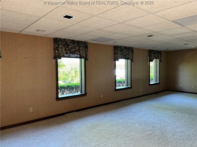 207 Mckinley Ave, Charleston, WV 25314 - spare room with carpet floors, visible vents, and a drop ceiling