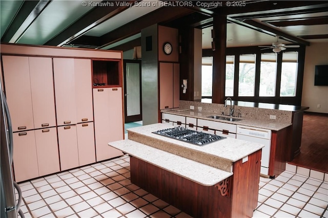 207 Mckinley Ave, Charleston, WV 25314 - kitchen with a sink, a kitchen island, white appliances, and white cabinetry