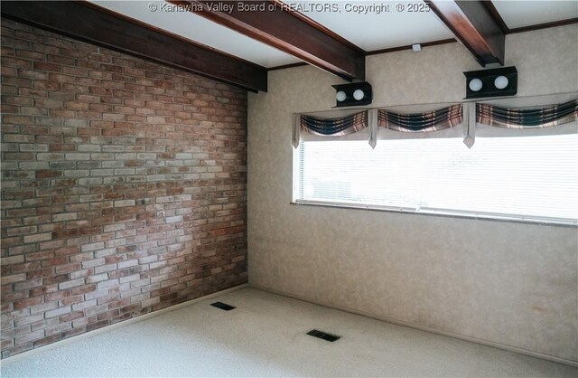 207 Mckinley Ave, Charleston, WV 25314 - unfurnished room featuring visible vents, carpet, and beam ceiling