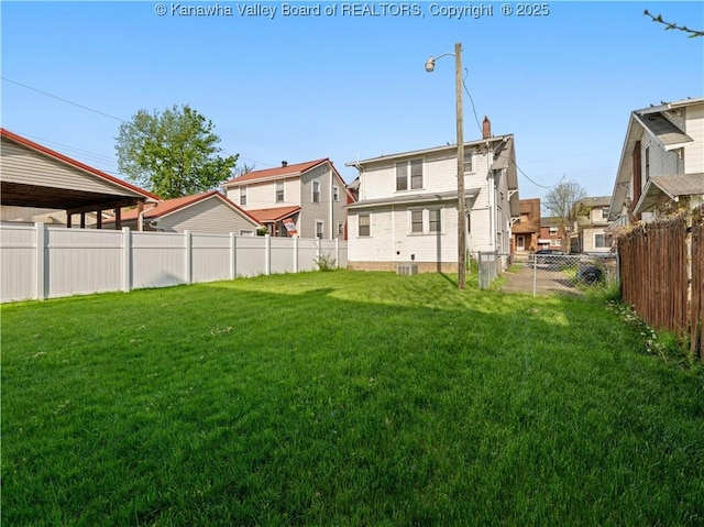 54 Hunt Ave, Charleston, WV 25302 - view of yard featuring a fenced backyard and a residential view