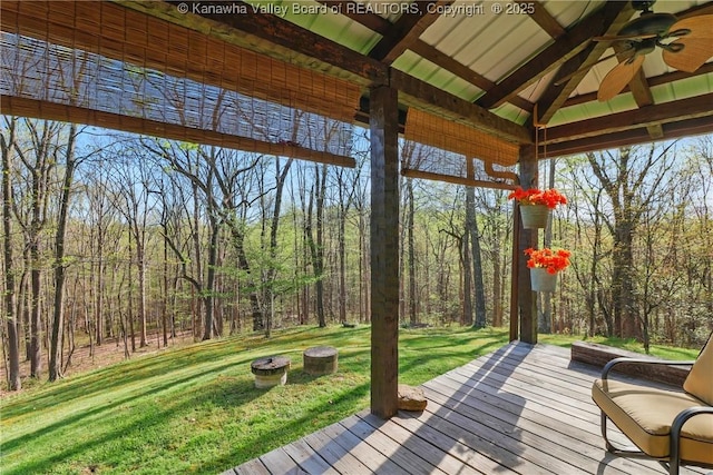 78 Cougar Mountain Dr, Winfield, WV 25213 - deck featuring a lawn, a ceiling fan, and a forest view