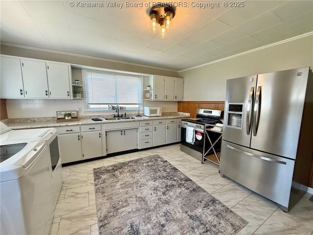 kitchen featuring appliances with stainless steel finishes, open shelves, ornamental molding, and marble finish floor