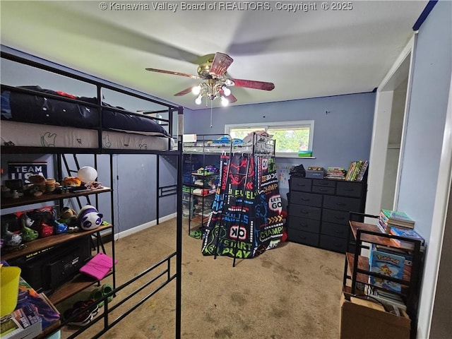 bedroom with ceiling fan and carpet flooring