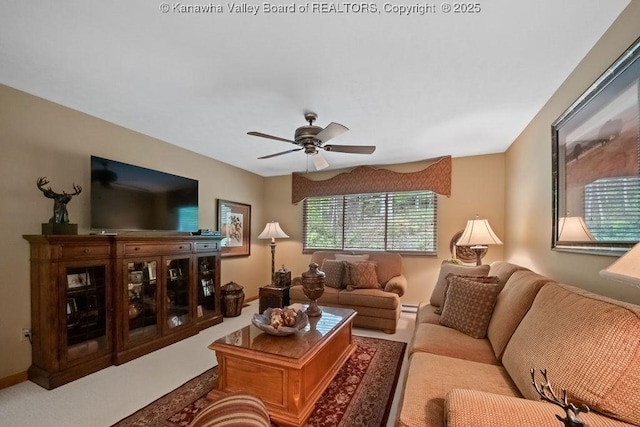 living room featuring a ceiling fan
