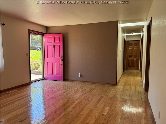 168 Jane Dr, Culloden, WV 25510 - foyer entrance featuring baseboards and light wood finished floors