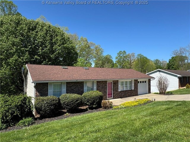 168 Jane Dr, Culloden, WV 25510 - ranch-style house featuring a garage, brick siding, a front lawn, and concrete driveway
