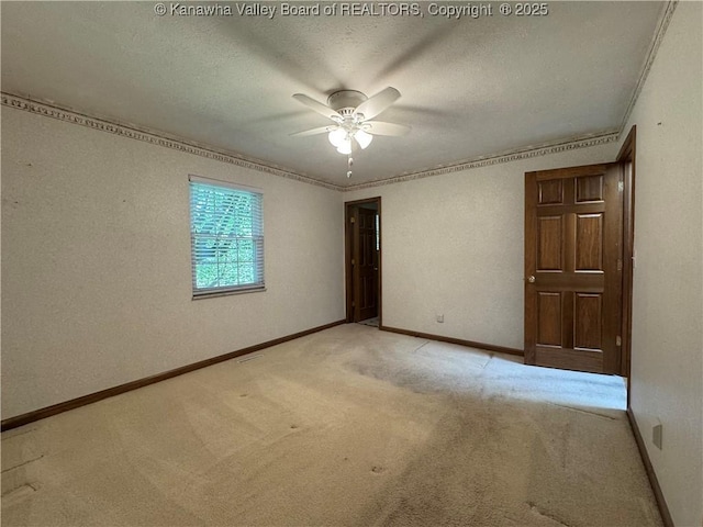 168 Jane Dr, Culloden, WV 25510 - unfurnished room featuring baseboards, light carpet, a ceiling fan, and a textured ceiling