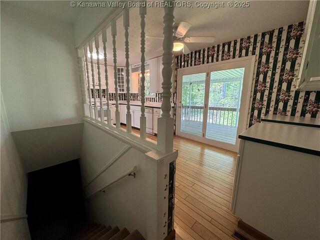 168 Jane Dr, Culloden, WV 25510 - staircase featuring wood finished floors and ceiling fan