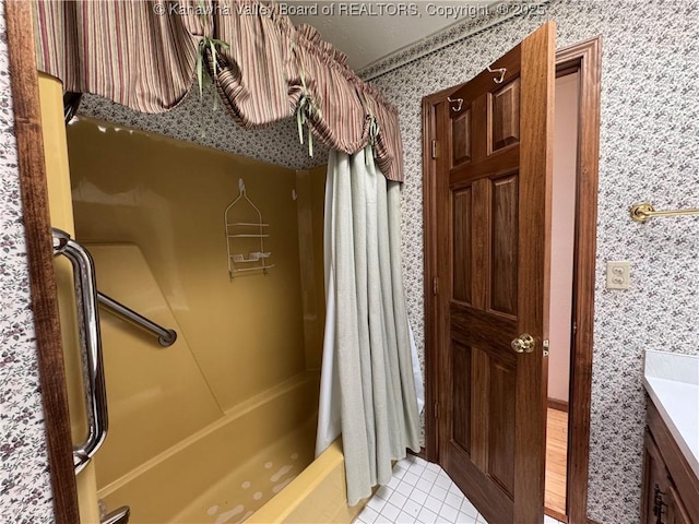 168 Jane Dr, Culloden, WV 25510 - full bath featuring curtained shower, vanity, tile patterned flooring, and wallpapered walls