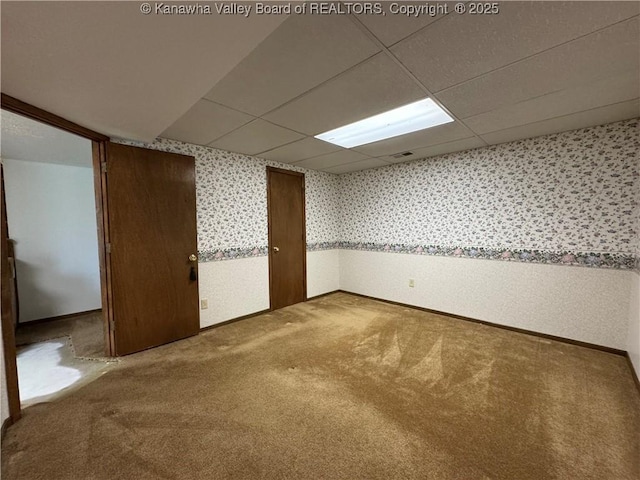 168 Jane Dr, Culloden, WV 25510 - carpeted empty room with wallpapered walls and a drop ceiling