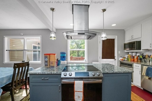 901 Evanwood Rd, Charleston, WV 25314 - kitchen with appliances with stainless steel finishes, island range hood, white cabinetry, wood finished floors, and stone countertops