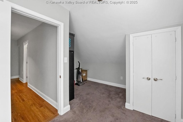 901 Evanwood Rd, Charleston, WV 25314 - corridor featuring baseboards, lofted ceiling, and carpet