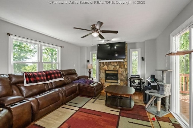 901 Evanwood Rd, Charleston, WV 25314 - living room with wood finished floors, ceiling fan, and a fireplace