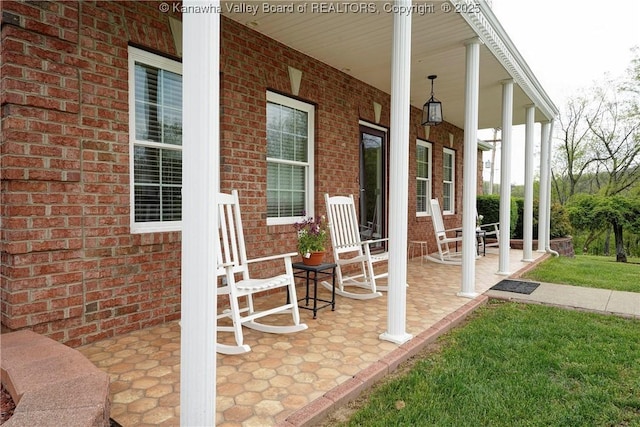219 Deerhaven Ln, Cross Lanes, WV 25313 - view of patio with a porch