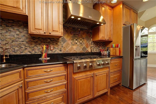 219 Deerhaven Ln, Cross Lanes, WV 25313 - kitchen with dark wood-style floors, a sink, tasteful backsplash, wall chimney exhaust hood, and appliances with stainless steel finishes
