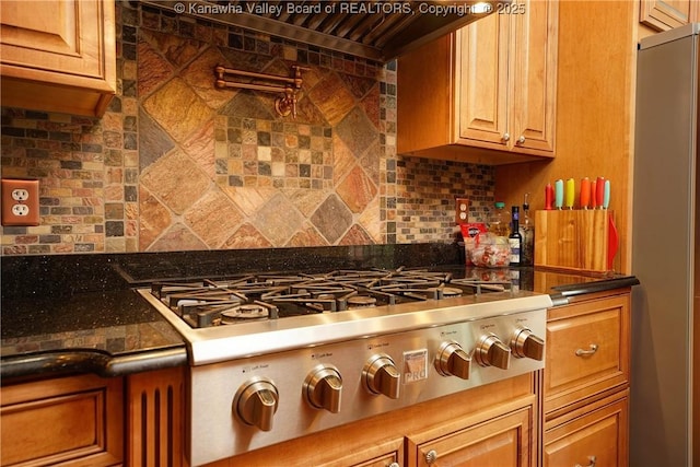 219 Deerhaven Ln, Cross Lanes, WV 25313 - kitchen featuring appliances with stainless steel finishes, exhaust hood, and backsplash