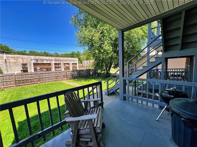 view of patio / terrace featuring a fenced backyard and stairway