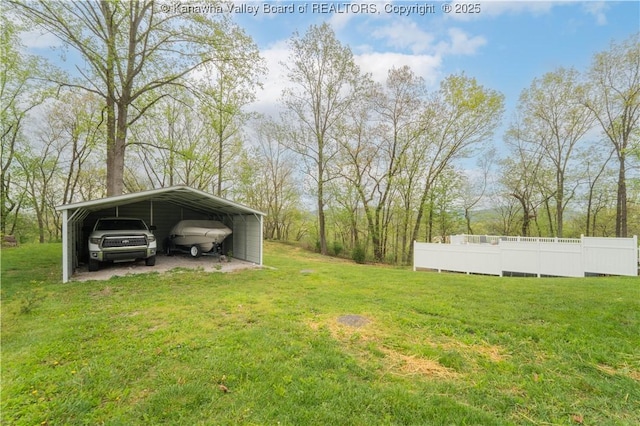view of yard with a detached carport