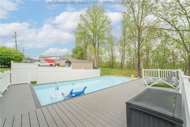 view of pool featuring a deck