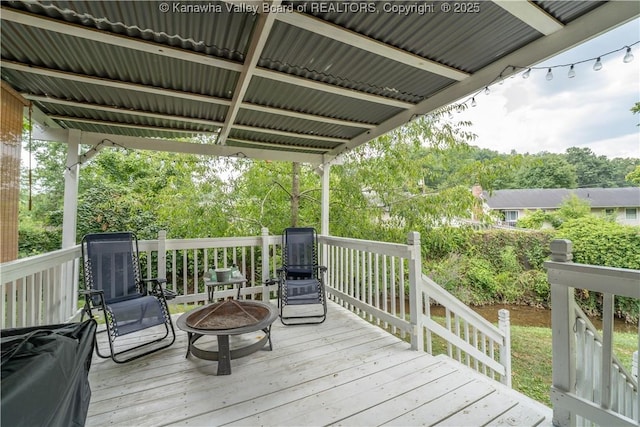 deck with a fire pit