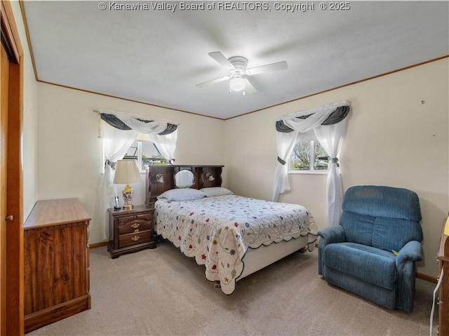 bedroom featuring baseboards, carpet flooring, and ceiling fan