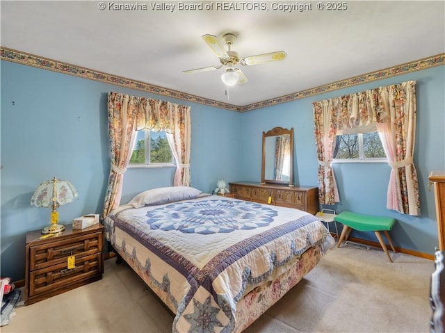bedroom with carpet floors and a ceiling fan